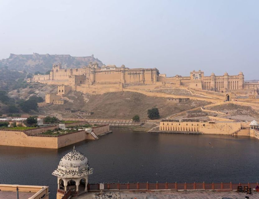 Jaipur: Full Day Sightseeing Tour By Car & Local Tour Guide - Jal Mahal over Man Sagar Lake: postcard views with context