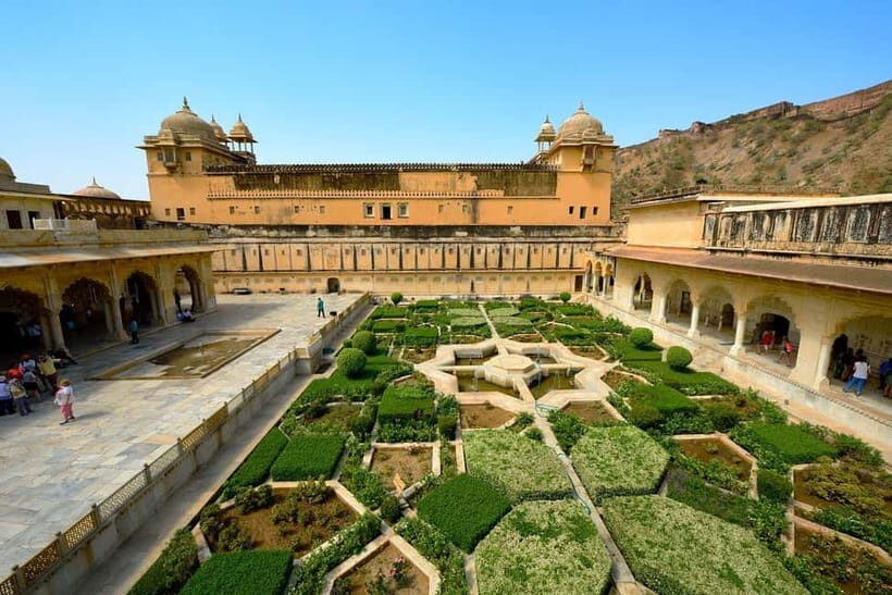 Jaipur: Private City Tour with Car, Guide, Tickets & Lunch - Jal Mahal lake views: quick and scenic, not time-sinky